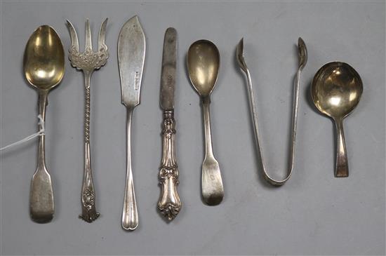 Seven items of silver cutlery, including a George III beaded caddy spoon, Thomas Wallis II, London 1792, 4.4oz. gross